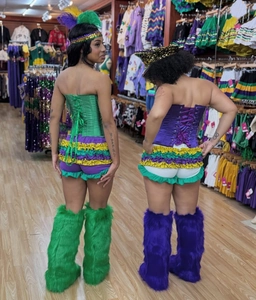 Detail of Mardi Gras bodice with lacing, ruffled shorts and plush leg warmers