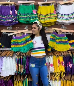 Detailed view of layered ruffles and sequin textures on a colorful Mardi Gras tutu skirt