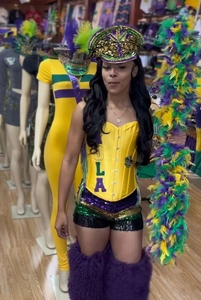 Detail of Mardi Gras sequin corset with NOLA print and fleur-de-lis festival motif
