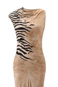 Detail of slim fit dress featuring tiger print pattern and side ruching details