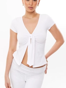 White V-neck short sleeve crop top with front tie detail and front slit design