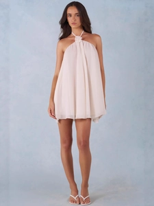 Beige halter neck chiffon dress with 3D flower detail and flowy A-line silhouette