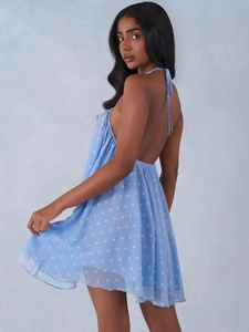 Light blue polka dot backless halter dress with tie-neck detail for summer vacation