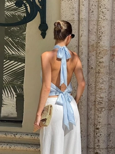 Light blue satin halter neck top with large back ribbons and backless design for summer