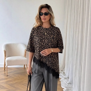 Women leopard print short sleeve T-shirt with asymmetrical lace hem on a model