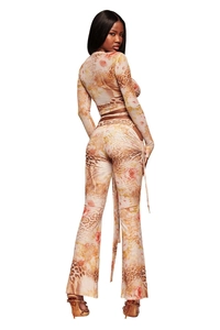 Detailed back view of leopard and floral print crop top and flared pants set