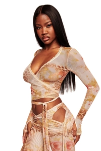 Detail of printed mesh two-piece set featuring V-neck wrap top and lace trim