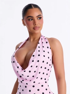 Pink halter neck jumpsuit with black polka dots and a deep V-neckline for women