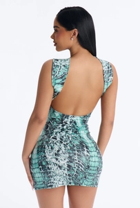 Detail of snake print bodycon dress featuring deep U-shape backless design