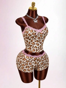 Women's leopard print two-piece loungewear set with pink lace trim and bow detail
