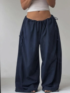 Oversize dark blue wide-leg sweatpants with drawstring elastic waist and street style