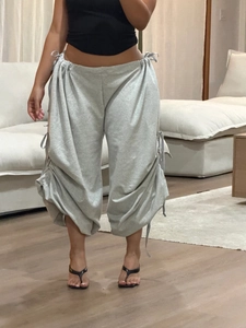 Light grey wide leg sweatpants with adjustable drawstring side ruched details and loose fit