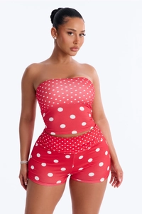 Detail of red polka dot two-piece set featuring tube top and slim-fit shorts for women