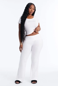 Detail showing the silver glitter Bride lettering on white short sleeve crop top