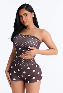Detailed view of brown polka dot two-piece set featuring backless tube top and fitted shorts