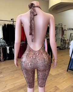 Detail of the back tie-up neck and open back on this sexy snakeskin print romper jumpsuit
