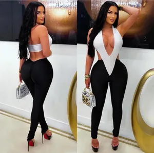 Detail of contrast stitch deep V neck backless jumpsuit with slimming fit design
