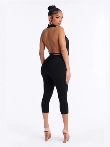 Sexy black halter neck backless jumpsuit with studs and cropped leggings for women