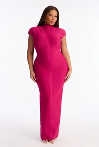 Close-up of hot pink bandage dress showing high neckline and premium elastic texture