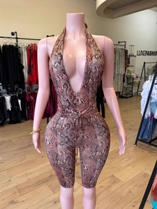 Sexy snake print halter jumpsuit with a deep V-neck and backless design for women