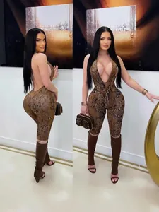 Sexy brown snakeskin print jumpsuit with deep V-neck, halter neck and backless design