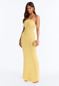 Detailed knit texture and golden ring neck hardware on a yellow halter maxi dress