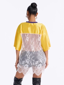 Yellow satin short sleeve top for women featuring white lace patchwork back and eyelash hem
