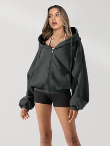 Women's oversized dark grey zip-up hoodie with dropped shoulders and ribbed cuffs