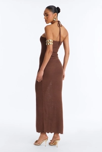 Detail view of brown crochet knit maxi dress with intricate halter neckline and open back