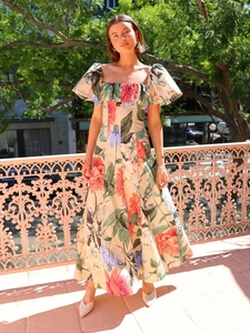 Floral print maxi dress with puff sleeves and square neck for a vintage beach vacation look