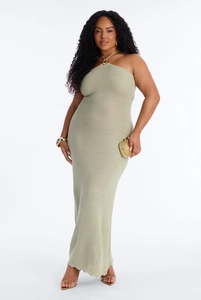 Detail of light green knit halter dress featuring a golden metallic buckle on the neckline