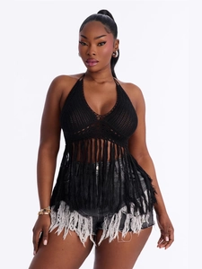 Women's black crochet halter top featuring hollow knit mesh and long fringe tassel hem