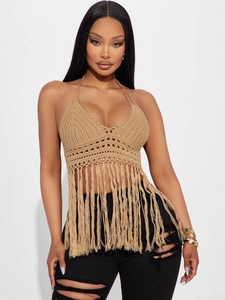 Bohemian crochet halter top in beige with hollow knit patterns and long fringe tassels