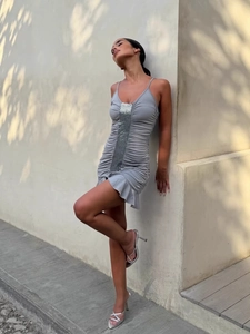 Grey ruched mini dress with silver sequins and ruffled hem for summer fashion