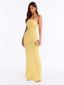 Elegant bright yellow knit halter maxi dress with golden ring detail for summer vacation