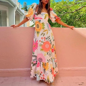 Elegant floral A-line maxi dress with sunflower print, square neck and puff sleeves
