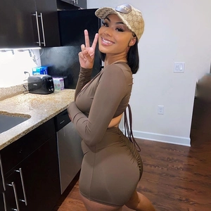 Sexy dark brown long sleeve romper with front zipper and back ruching details