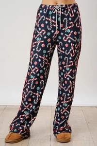 Detail of Christmas pajama pants with candy cane print and gray drawstring waist