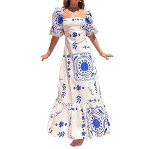 Elegant white square neck maxi dress with blue sun prints and puff sleeves