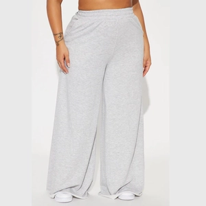 Macro detail of heather grey wide-leg yoga pants with high-waisted elastic waistband