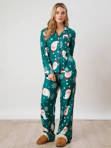 Women's dark green Christmas pajama set with Santa Claus prints and red piping trim