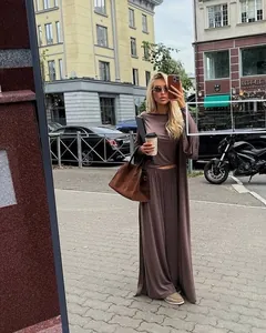 Chic mocha brown three-piece set with long cardigan, crop top, and wide-leg knit trousers