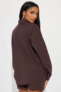 Detailed back view of dark brown pinstripe oversized shirt and matching shorts set