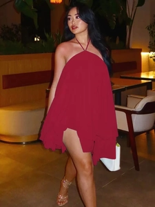 Close-up of wine red backless dress with layered mesh ruffles and thin halter straps