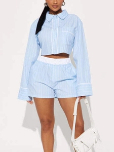 Women's light blue striped lounge set with button-down shirt and shorts