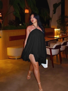 Chic black backless halter mini dress with layered ruffle skirt for summer evening