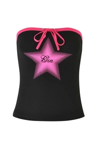 Detail of black tube top with pink star print and Gia lettering with a small bow knot