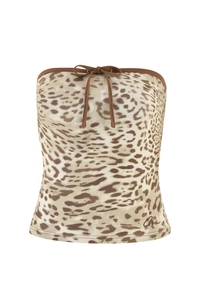 Detail of leopard print tube top featuring a bow drawstring and Gia signature print