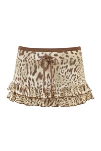 Detail of tiered ruffle leopard print skirt with adjustable drawstring waist and low-rise cut