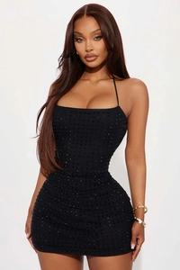 Detailed view of black rhinestone sequins on a slim fit halter neck party dress